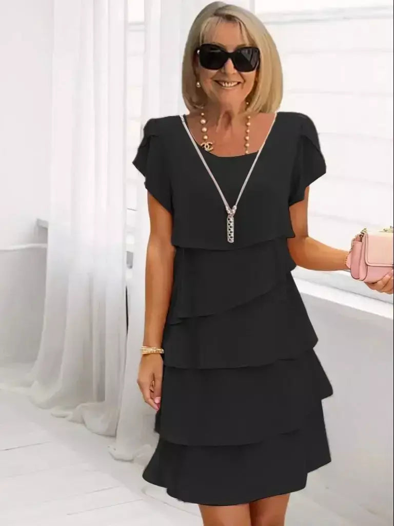 Minivestido feminino casual multicamadas de cor sólida com gola redonda e manga curta