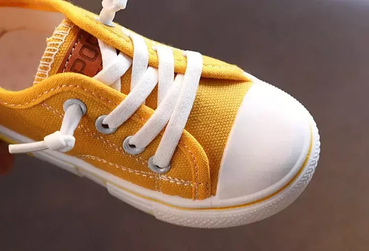 Sapatos canva de cano baixo infantil 2025 primavera novo estilo branco doce cor masculino feminino infantil pai-filho sapatos de tabuleiro