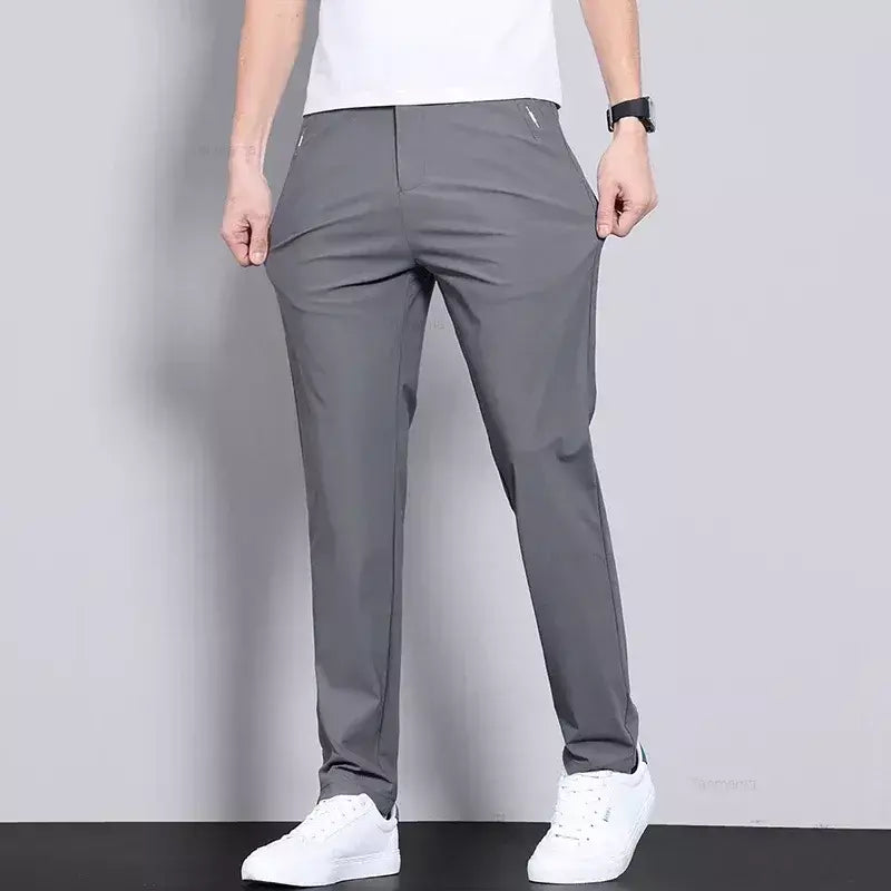 Calças casuais masculinas elásticas ultrafinas verão de secagem rápida seda gelo magro em linha reta negócios cor sólida preto cinza
