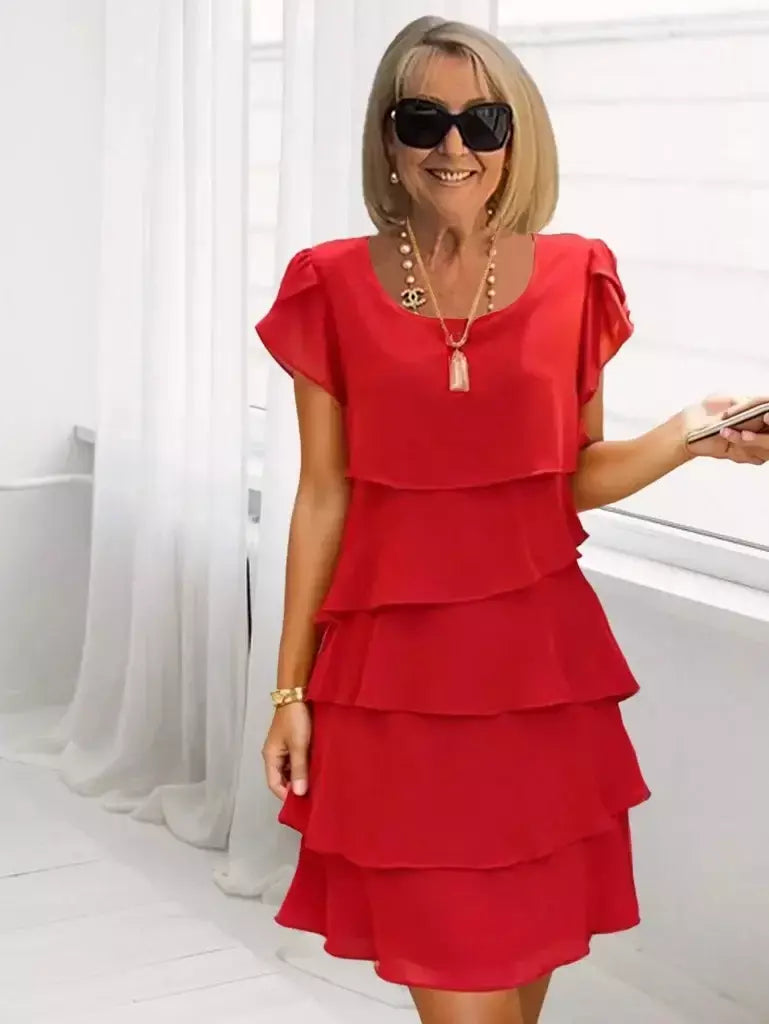 Minivestido feminino casual multicamadas de cor sólida com gola redonda e manga curta