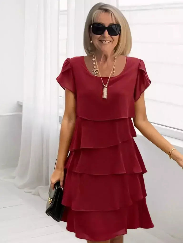 Minivestido feminino casual multicamadas de cor sólida com gola redonda e manga curta