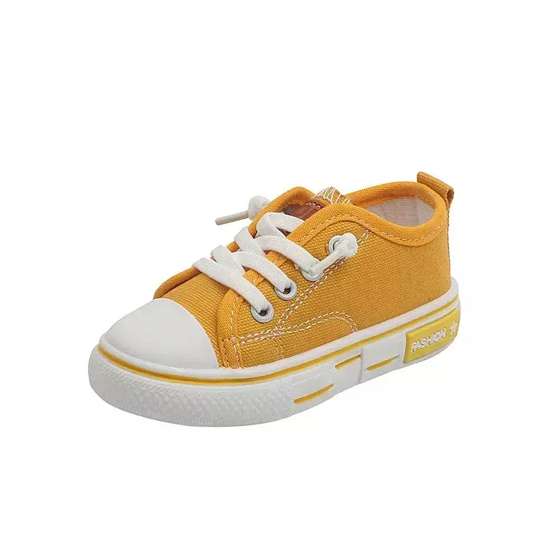 Sapatos canva de cano baixo infantil 2025 primavera novo estilo branco doce cor masculino feminino infantil pai-filho sapatos de tabuleiro