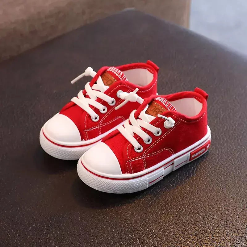 Sapatos canva de cano baixo infantil 2025 primavera novo estilo branco doce cor masculino feminino infantil pai-filho sapatos de tabuleiro