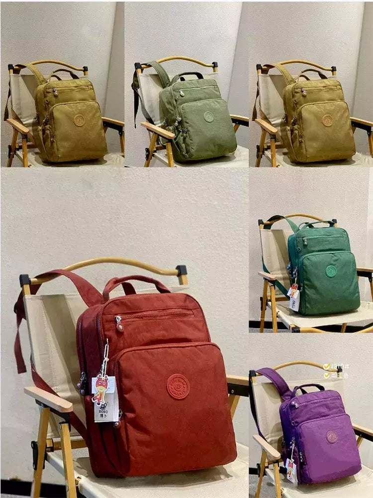 Mochila impermeável de nylon para homens e mulheres, mochila leve para laptop,