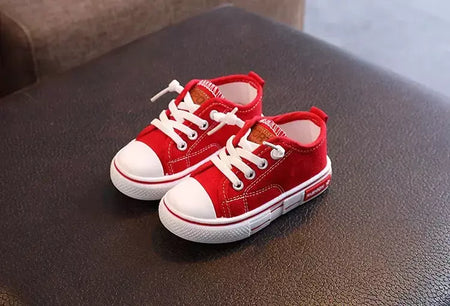 Sapatos canva de cano baixo infantil 2025 primavera novo estilo branco doce cor masculino feminino infantil pai-filho sapatos de tabuleiro