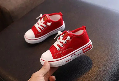 Sapatos canva de cano baixo infantil 2025 primavera novo estilo branco doce cor masculino feminino infantil pai-filho sapatos de tabuleiro
