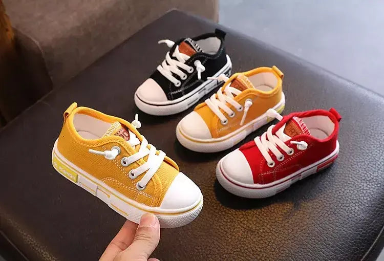 Sapatos canva de cano baixo infantil 2025 primavera novo estilo branco doce cor masculino feminino infantil pai-filho sapatos de tabuleiro