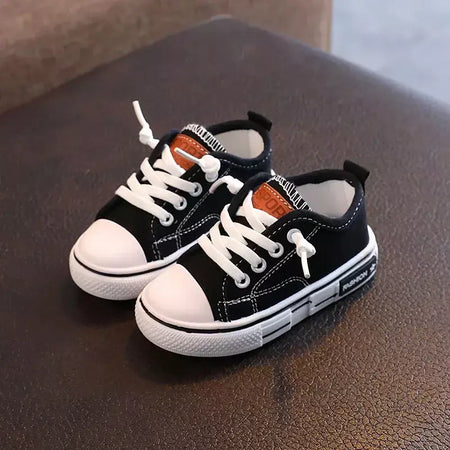 Sapatos canva de cano baixo infantil 2025 primavera novo estilo branco doce cor masculino feminino infantil pai-filho sapatos de tabuleiro
