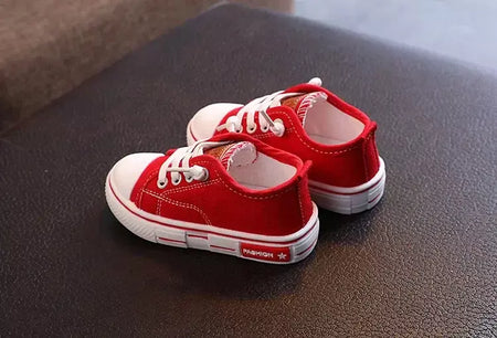 Sapatos canva de cano baixo infantil 2025 primavera novo estilo branco doce cor masculino feminino infantil pai-filho sapatos de tabuleiro