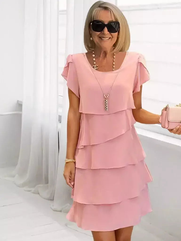 Minivestido feminino casual multicamadas de cor sólida com gola redonda e manga curta