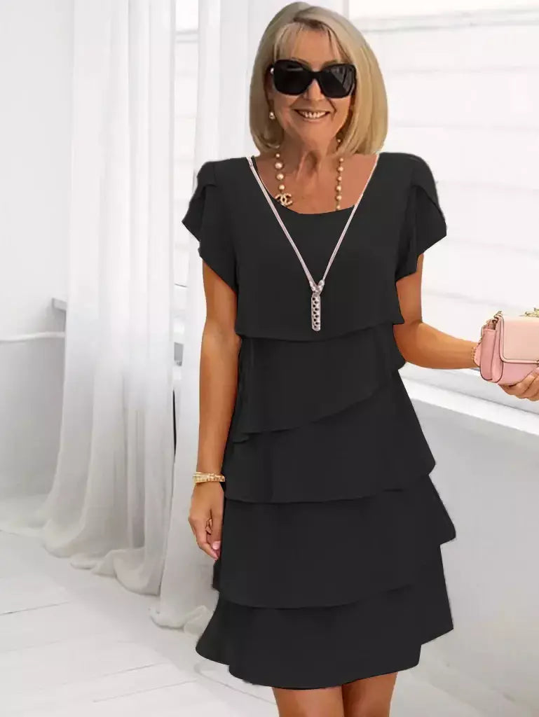 Minivestido feminino casual multicamadas de cor sólida com gola redonda e manga curta